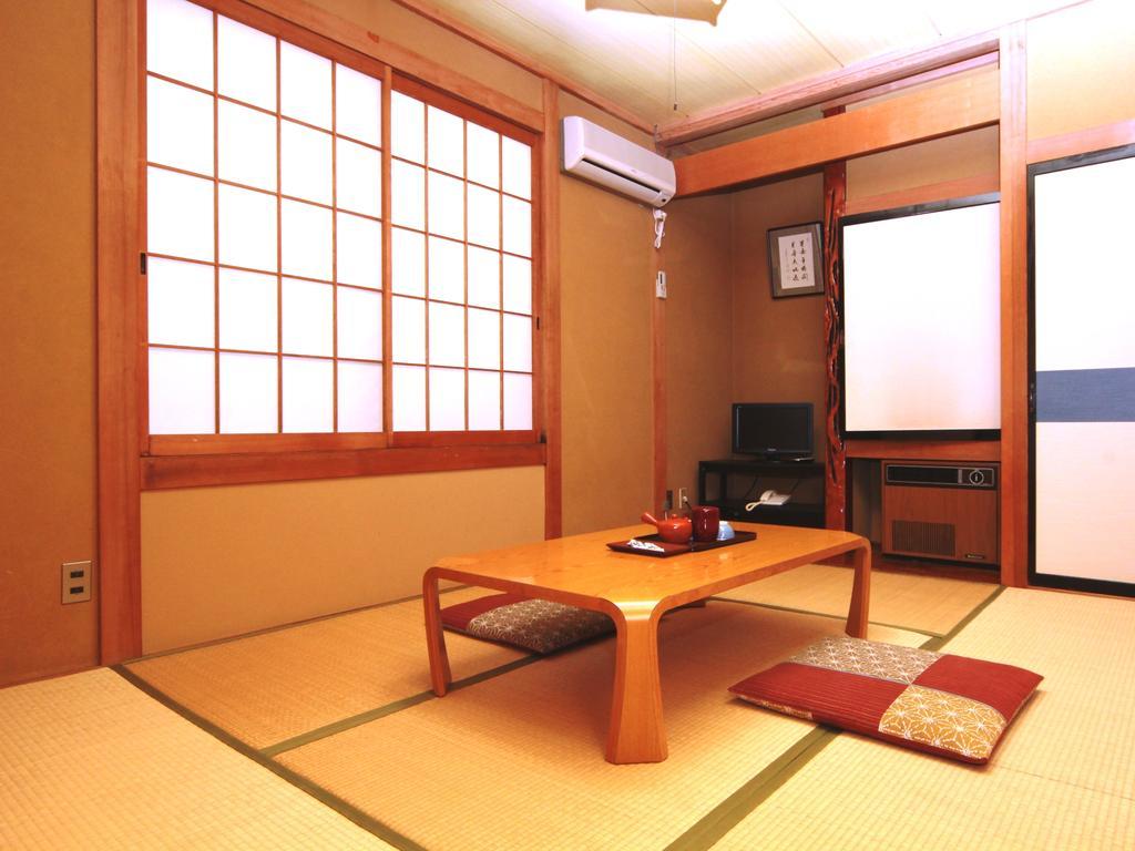 Honkan Gentaroya Hotell Nozawaonsen Rom bilde