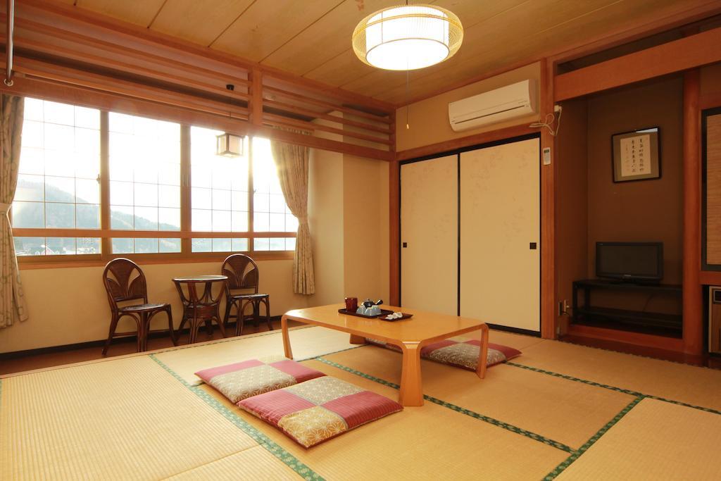 Honkan Gentaroya Hotell Nozawaonsen Rom bilde